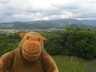 Mr Monkey looking at the Wallace Monument from the Nether Bailey