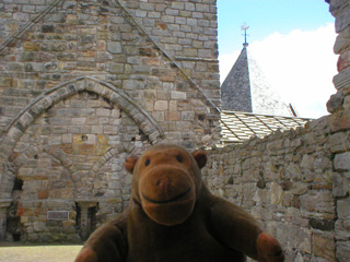 Mr Monkey the top of the rood screen