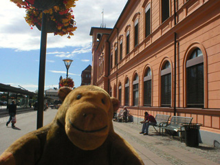 Mr Monkey beside the main station building