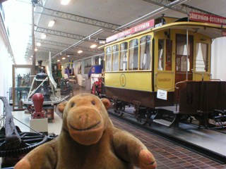 Mr Monkey looking at an old Malmö tramcar