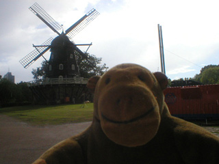 Mr Monkey in front of a windmill