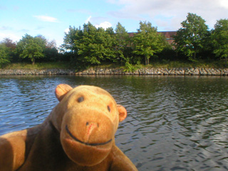 Mr Monkey passing the Malmohus by boat