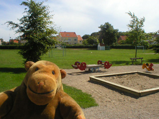 Mr Monkey in a children's playground