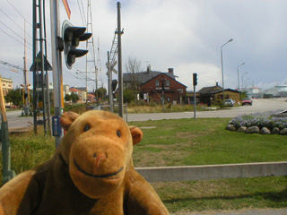 Mr Monkey looking up a road towards the docks