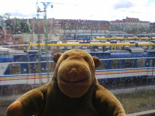 Mr Monkey looking at railway sidings in Gothenburg