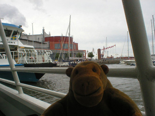 Mr Monkey aboard a boat leaving Lilla Bommen harbour