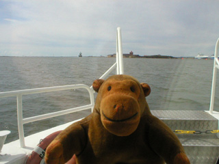 Mr Monkey looking towards the Nya Nya Elfsborg fortress from the front of boat
