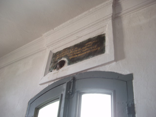 A cannon ball stuck in the lintel of the church door