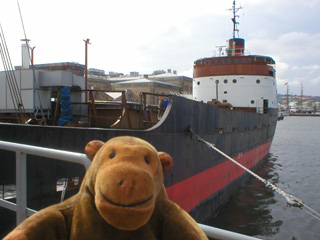 Mr Monkey boarding the cargo ship Fryken