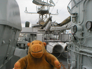 Mr Monkey looking at the Saab RB08s from beside an anti-aircraft turret