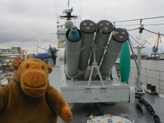 Mr Monkey examining the anti submarine missiles