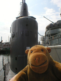Mr Monkey looking at the Nordkaparen's conning tower