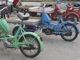 A row on motortrikes on the harbour