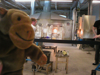 Mr Monkey watching Mr Rik rolling a glass