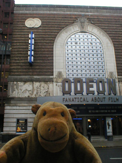 Mr Monkey looking at the Covent Garden Odeon