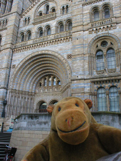 Mr Monkey approaching the front door of the Natural History Museum
