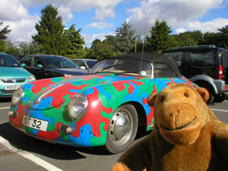 Mr Monkey looking at Thursday Next's Porsche