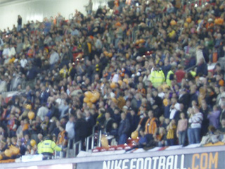 The Barnet supporters in the upper tier of the East Stand
