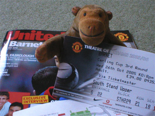 Mr Monkey with his souvenirs of the match