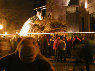 Mr Monkey watching people queue to go inside the Ice Monster