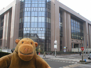 Mr Monkey looking at the Justus Lipsius building