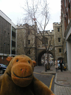 Mr Monkey looking back at St John's Priory gatehouse