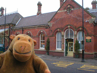 Mr Monkey in front of Il Forno in Tynemouth station