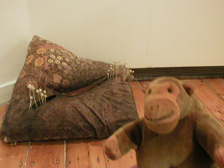 Mr Monkey with a damp cushion sculpture