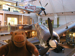 Mr Monkey looking at a Focke-Wulf 190 and a P51 Mustang