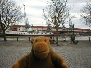 Mr Monkey looking down Narrow Quay towards the Industrial Museum