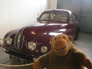 Mr Monkey looking at a Bristol 403 car