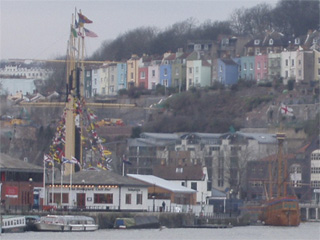 The masts of the S.S. Great Britain in the distance