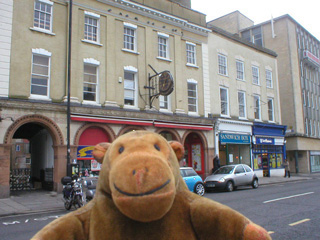 Mr Monkey outside the church of the priory of St John