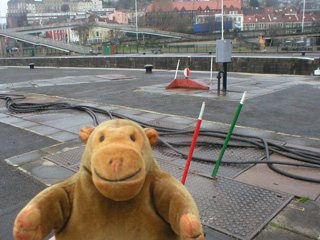 Mr Monkey examining levers beside the Howard lock