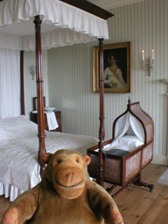 Mr Monkey in the bedroom of the Georgian House