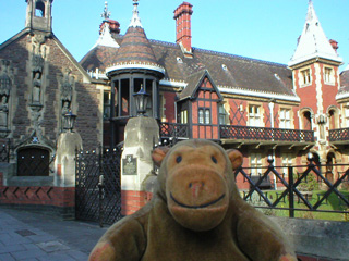 Mr Monkey looking at Foster's Almhouses