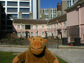 Mr Monkey looking at the Merchant Venturers' Almhouses
