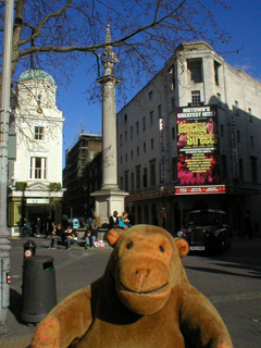 Mr Monkey looking at the Seven Dials street junction