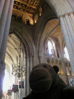 Mr Monkey looking at the crossing in Southwark Cathedral