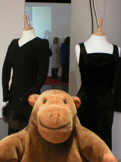 Mr Monkey with a pair of thirties black dresses