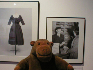 Mr Monkey with photos of war time rationing and a post-war Dior dress