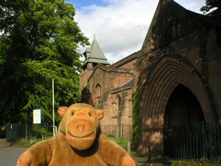 Mr Monkey outside the north porch of Saint John's