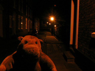 Mr Monkey on Abbey Street after dark