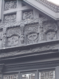 Carved panels on a gable on Watergate street