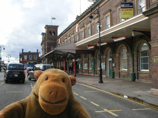 Mr Monkey outside Chester station