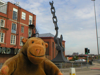 Mr Monkey examining one of the Skyhook sculptures from the other side