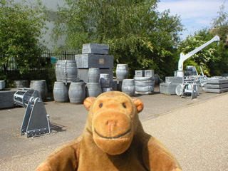 Mr Monkey looking at the Silent Cargoes sculpture