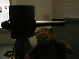 Mr Monkey looking at the 57mm cannon from a German A7V tank