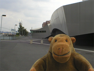 Mr Monkey scampering around the canal side face of the Imperial War Museum North