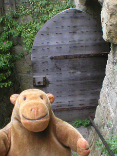 Mr Monkey scampering down to the dungeon door
